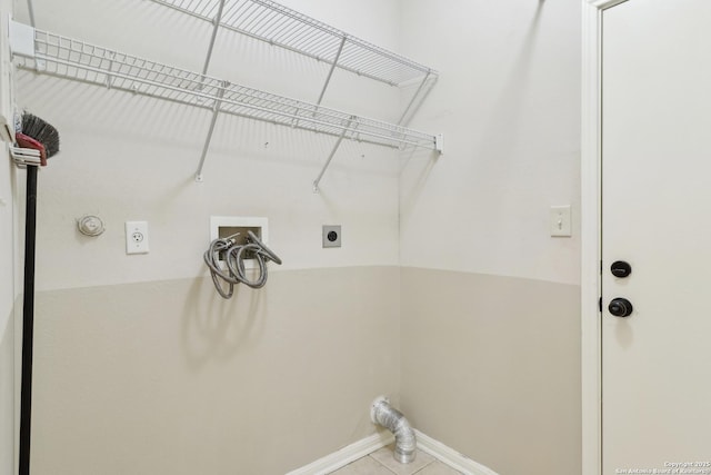 washroom with hookup for a washing machine, gas dryer hookup, electric dryer hookup, and tile patterned flooring