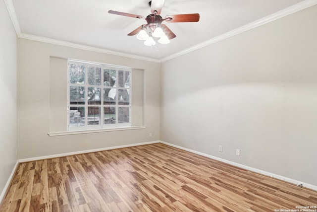 empty room featuring ornamental molding, ceiling fan, and light hardwood / wood-style flooring