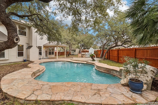 view of swimming pool featuring a gazebo and a patio area