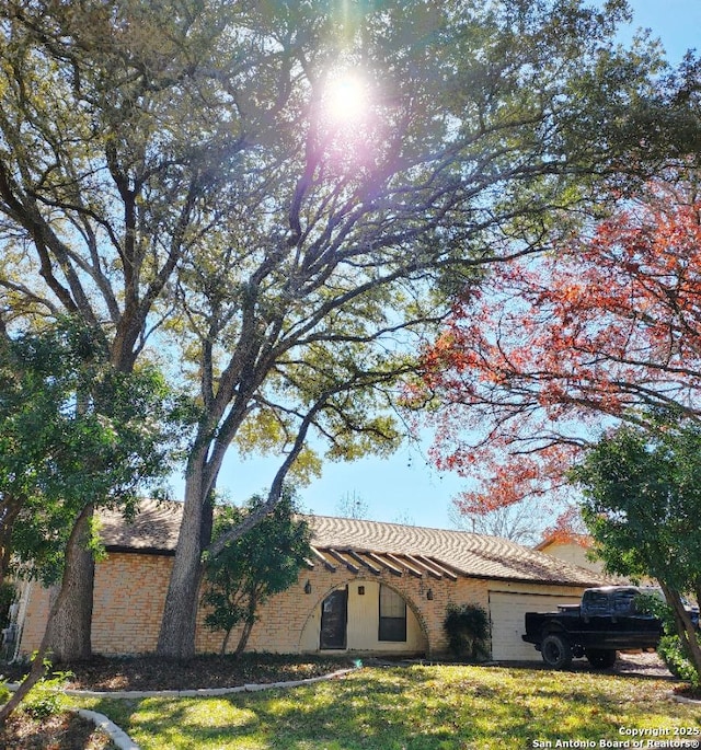 view of front of property with a garage