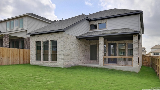 2606 Vistablue Ln, San Antonio, TX 78245 - rear view of property with brick siding and roof with shingles