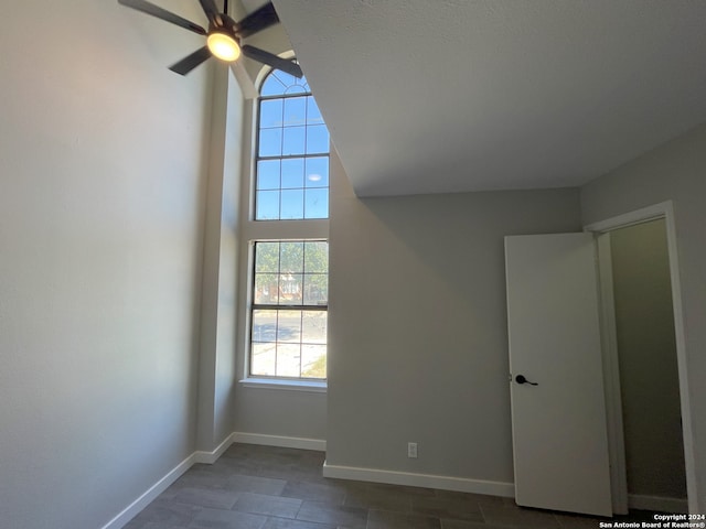 unfurnished bedroom featuring ceiling fan