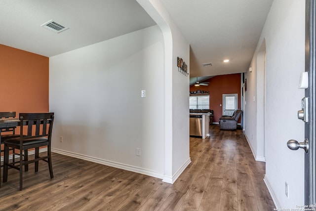 dining room with hardwood / wood-style flooring and ceiling fan