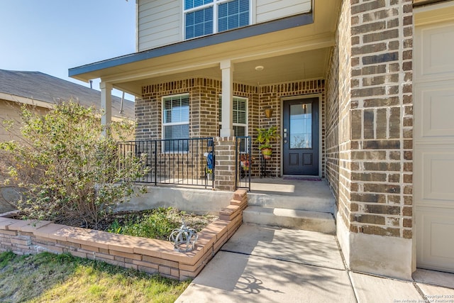 doorway to property featuring a porch