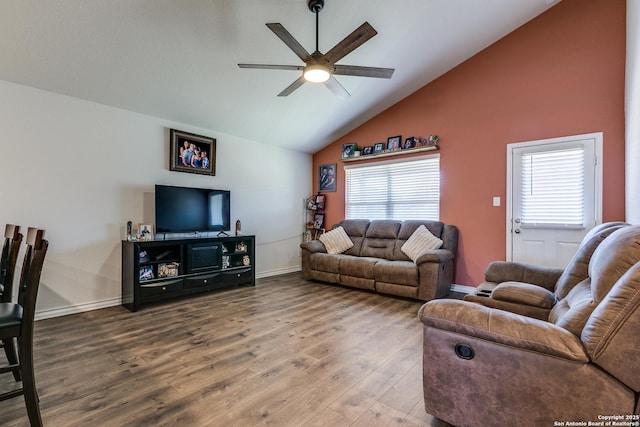 living room featuring wood-type flooring, high vaulted ceiling, and ceiling fan