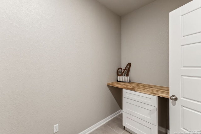 interior space featuring light tile patterned floors