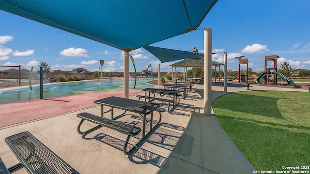 view of property's community with a gazebo and a playground