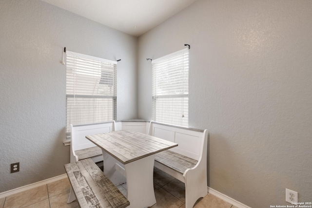 view of tiled dining space