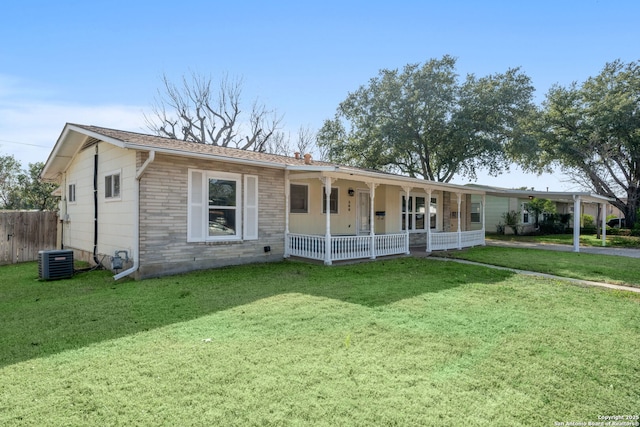 single story home with central AC, a front lawn, and covered porch