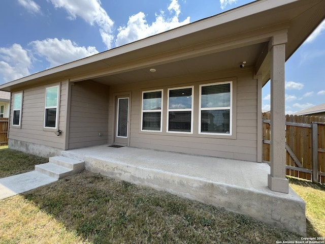 rear view of house with a patio area