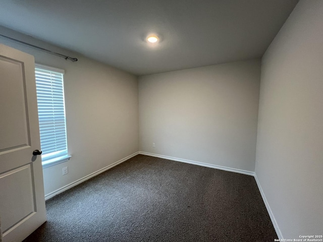 carpeted empty room featuring a healthy amount of sunlight