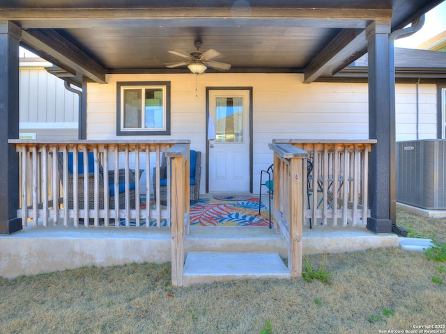 property entrance with ceiling fan, central air condition unit, and covered porch