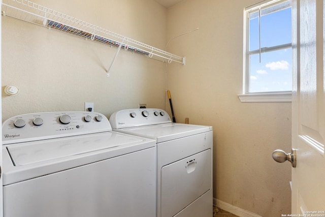 laundry room with independent washer and dryer