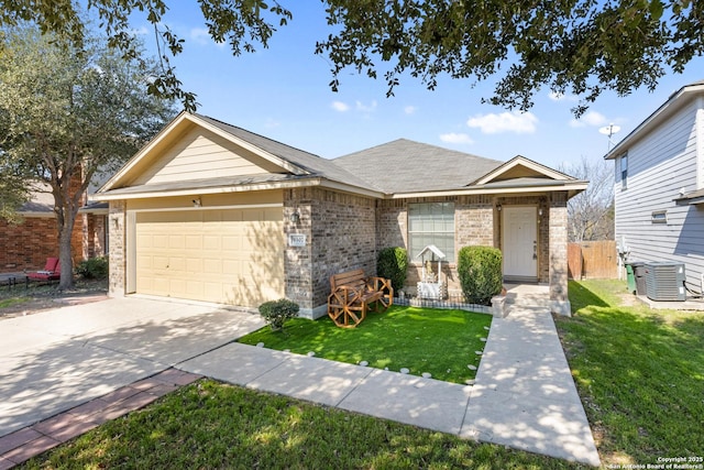 ranch-style house with central AC unit, a garage, and a front yard