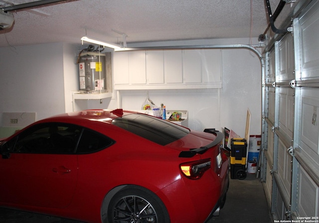 garage featuring water heater