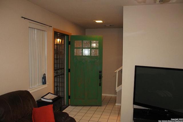 view of tiled foyer entrance