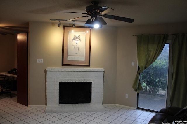 unfurnished living room with light tile patterned flooring, ceiling fan, and a fireplace