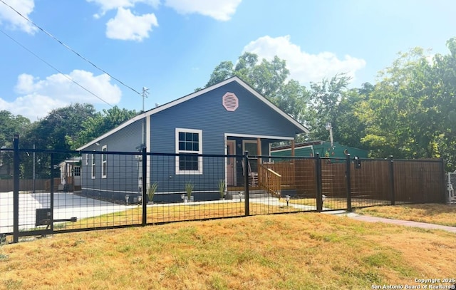 view of property exterior with a lawn