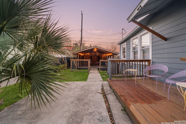 view of deck at dusk