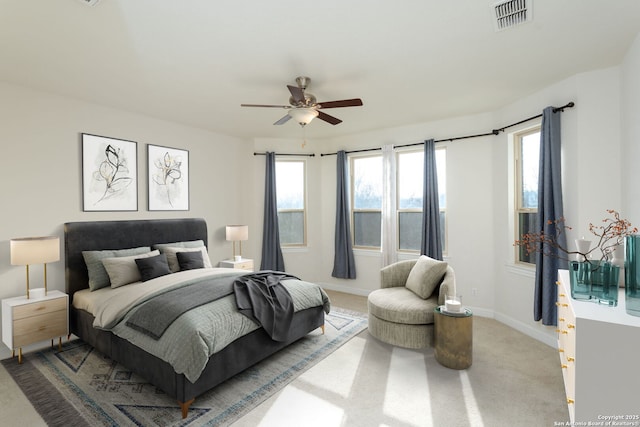 bedroom featuring multiple windows, carpet floors, and ceiling fan