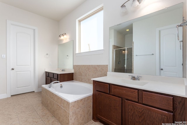 bathroom with vanity, tile patterned floors, and separate shower and tub