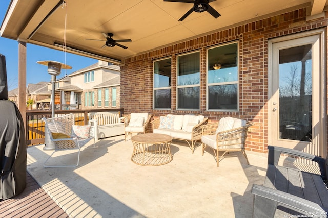 view of patio with an outdoor hangout area and ceiling fan