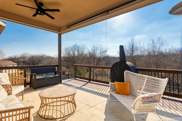 view of patio / terrace with an outdoor living space and ceiling fan