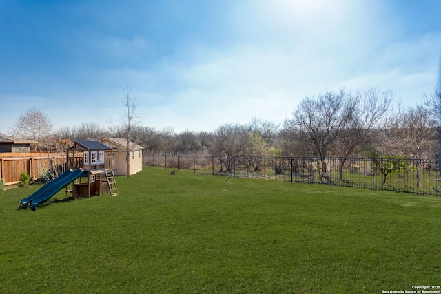 view of yard with a playground