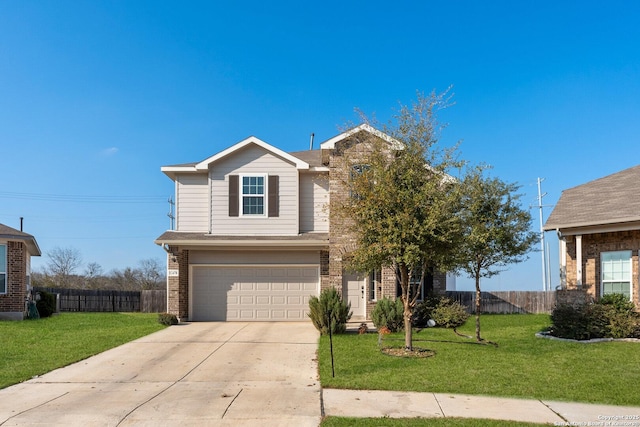 view of front of property featuring a garage and a front yard