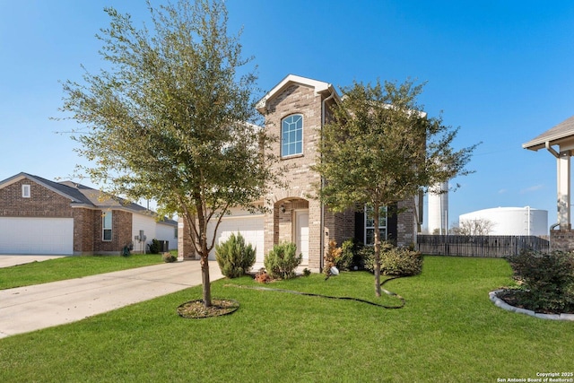 view of front of home with a garage and a front lawn