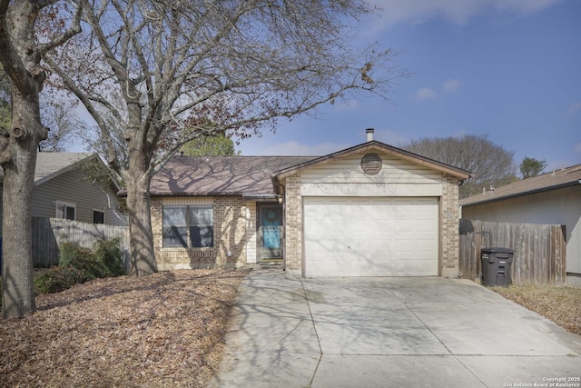 single story home featuring a garage