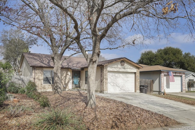 ranch-style home featuring a garage