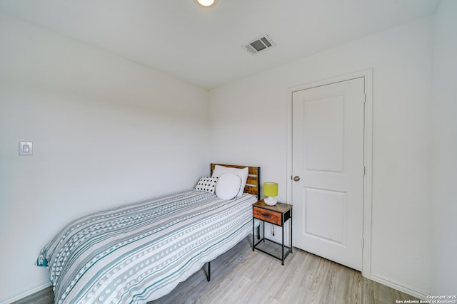 bedroom featuring light hardwood / wood-style flooring