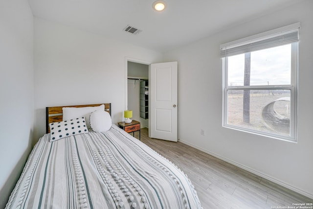 unfurnished bedroom featuring light hardwood / wood-style flooring