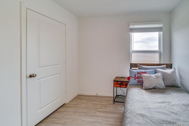 bedroom featuring light hardwood / wood-style flooring