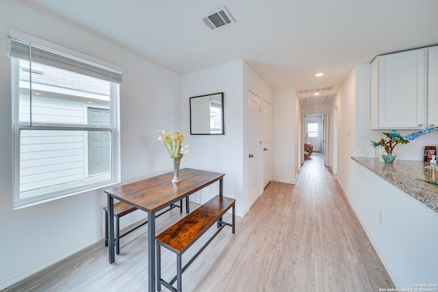 hall featuring light wood-type flooring