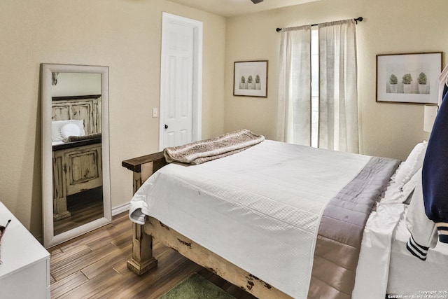 bedroom with wood-type flooring