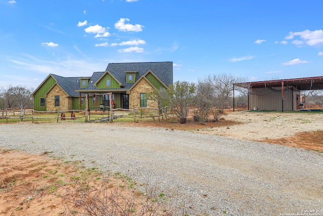 view of front of home with a carport