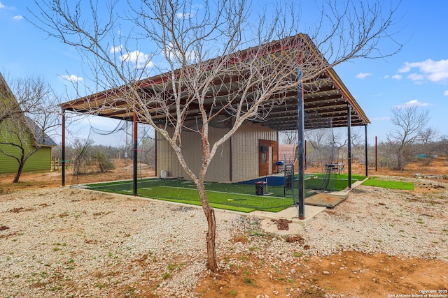 exterior space featuring an outbuilding and a yard