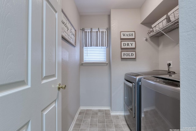 laundry area with washing machine and dryer