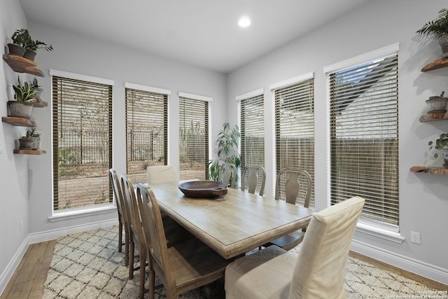 dining area featuring light wood-type flooring