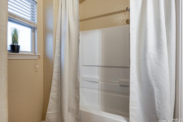 full bathroom featuring shower / bathtub combination with curtain