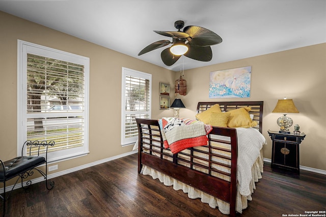 bedroom featuring dark wood-type flooring and ceiling fan