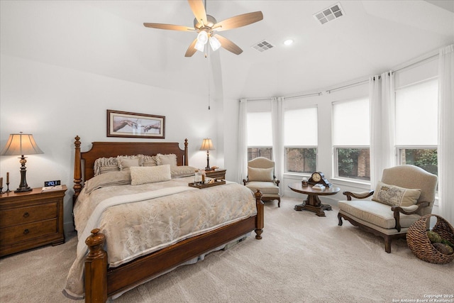 carpeted bedroom featuring ceiling fan and vaulted ceiling