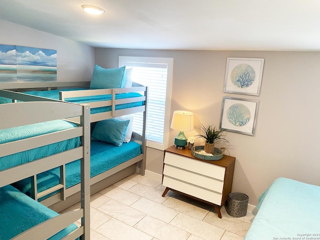 bedroom featuring tile patterned flooring