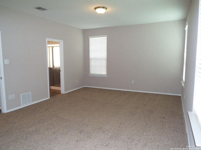 empty room with carpet floors