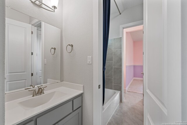 bathroom with vanity and tile patterned flooring