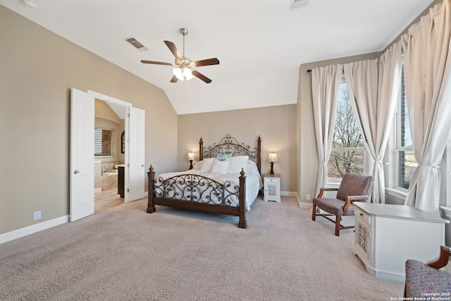 bedroom featuring light carpet, vaulted ceiling, visible vents, and baseboards