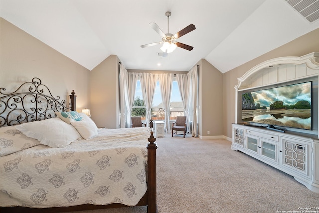 bedroom with a ceiling fan, light colored carpet, visible vents, and lofted ceiling