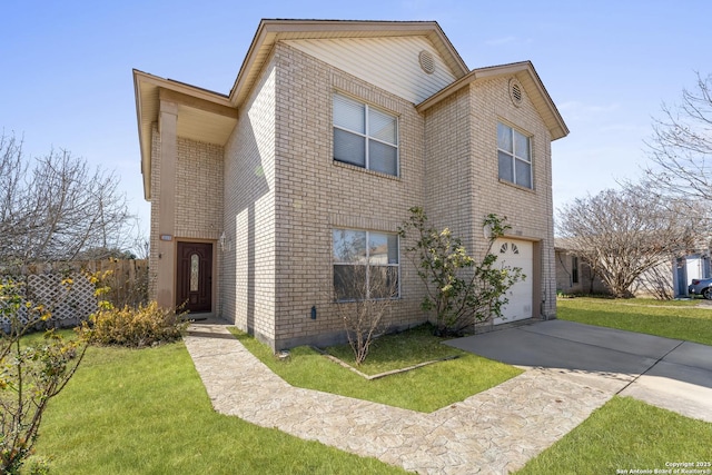 view of front of home featuring a garage and a front yard